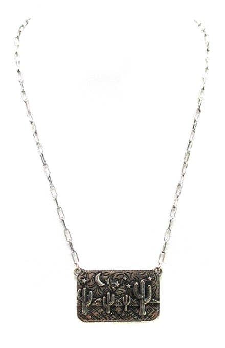 Western cactus pendant necklace with engraved desert design on silver chain