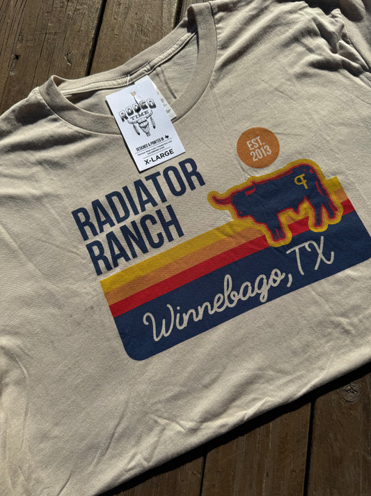 Light Grey tee with Radiator Ranch Winnebago TX with yellow, orange, red & navy strips and a cow by Dale Brisby
