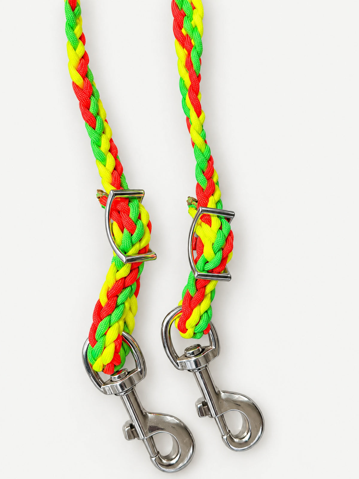Bright green, yellow and red roper reins — trigger snaps and adjustment fittings