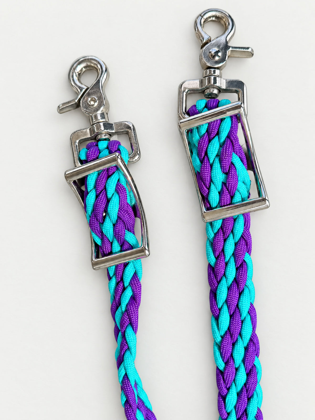 Turquoise & Purple handbraided barrel reins — attachment fittings