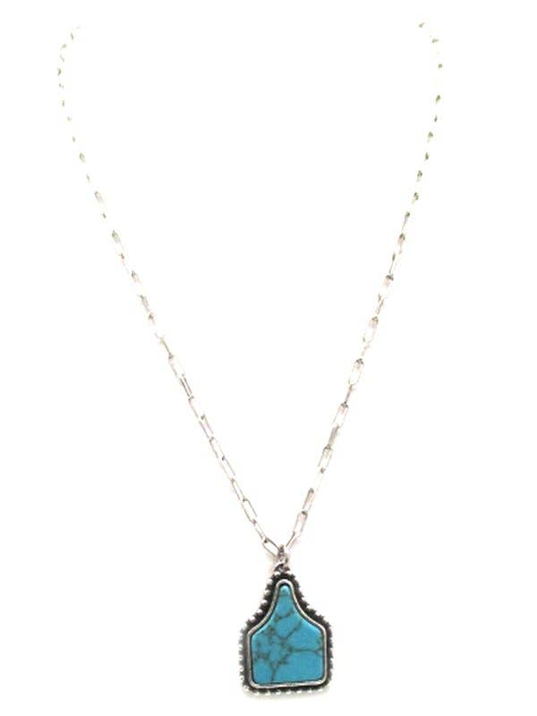 Turquoise cattle tag necklace with western rodeo style design on silver chain