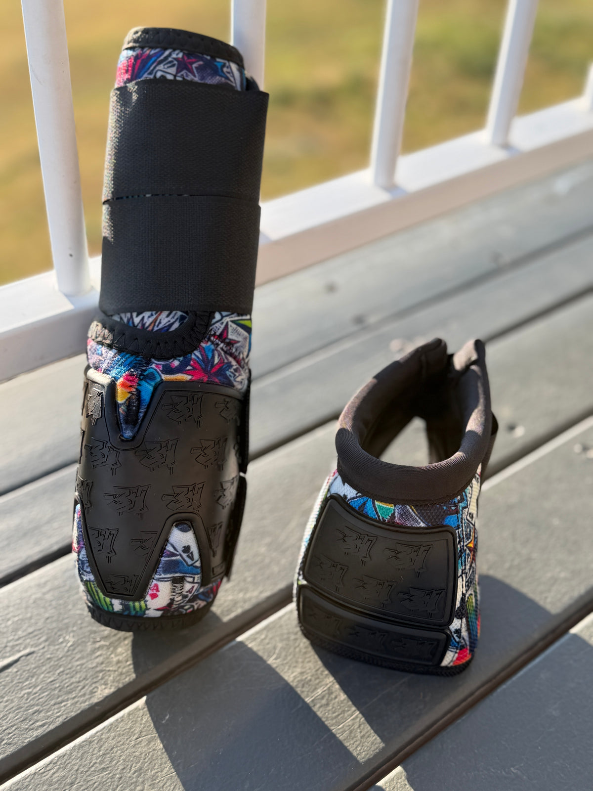High Stakes sport boot and matching bell boot with bright western print, black straps and bar3H rubber panels.