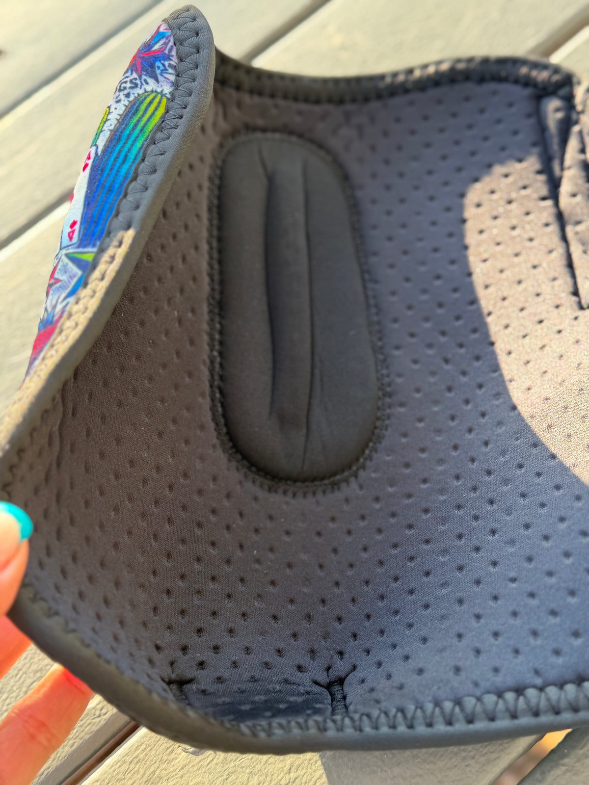 Close-up of the High Stakes sport boot interior with perforated lining, stitched edging and raised inner pad.