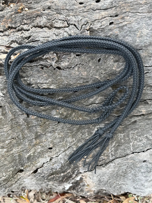 Black 8-strand hand-braided split reins with loop ends and tassels, shown without trigger snaps