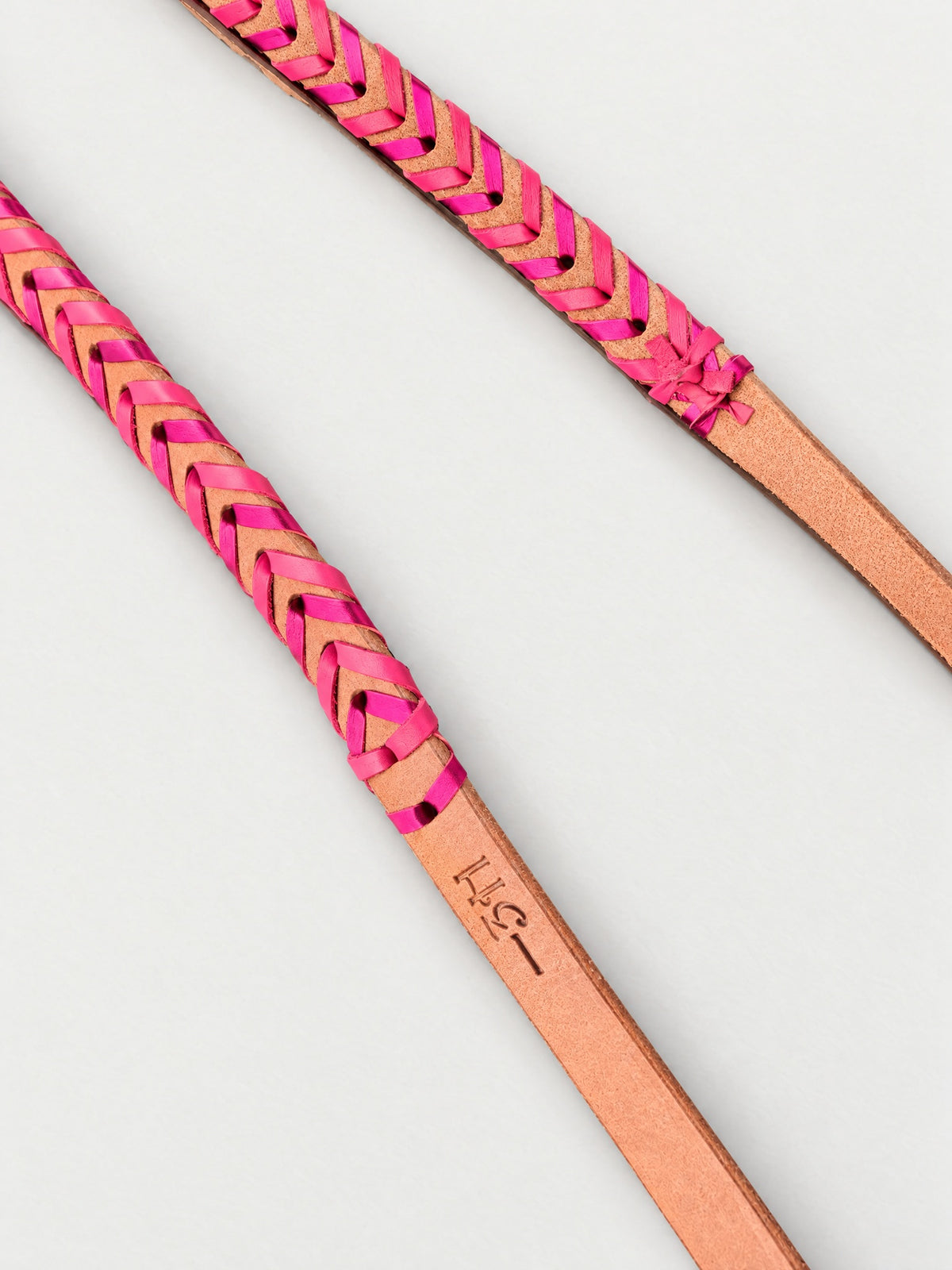 Tan & Hot Pink double-laced leather reins — lacing detail