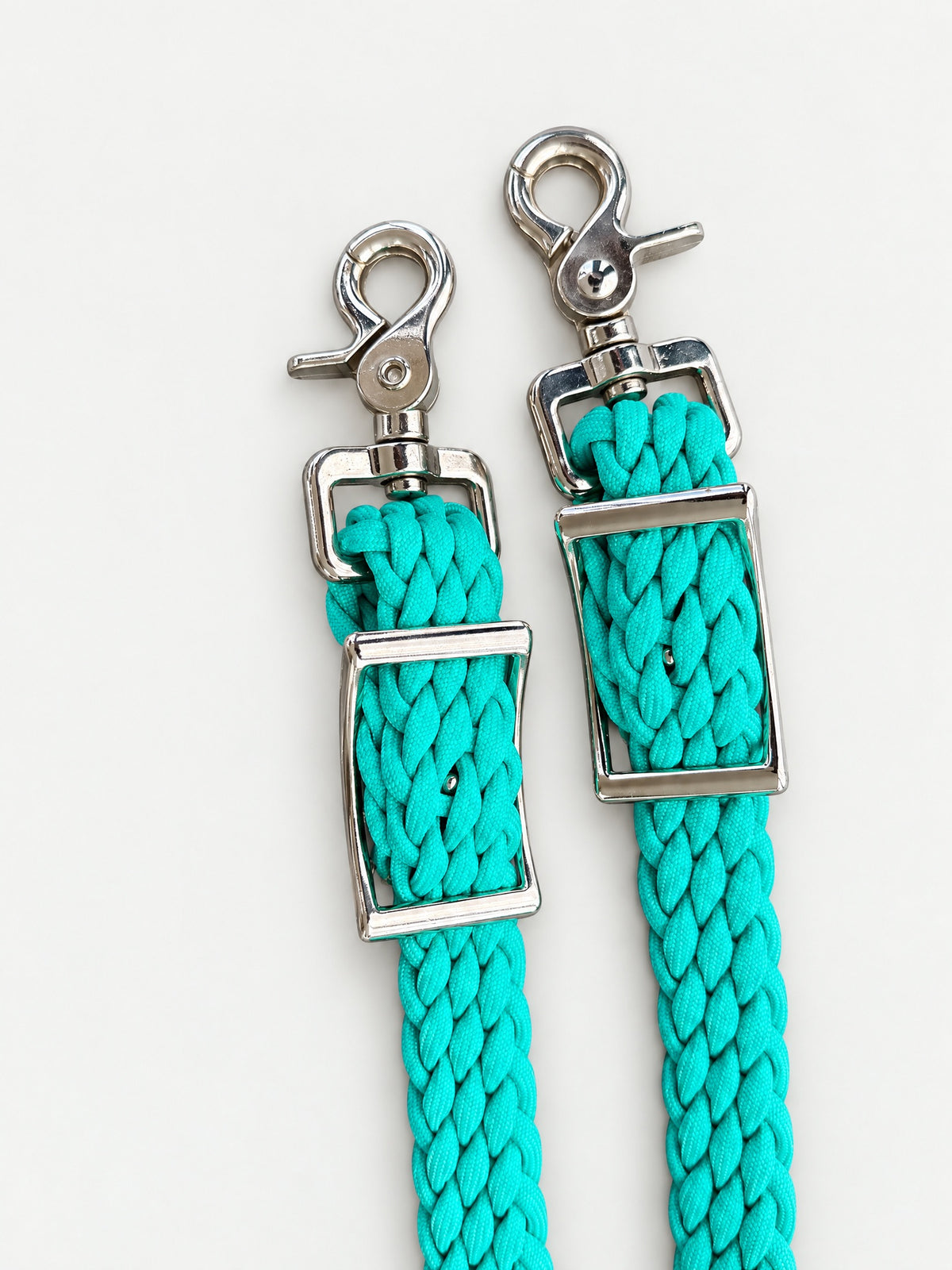 Turquoise handbraided barrel reins — attachment fittings