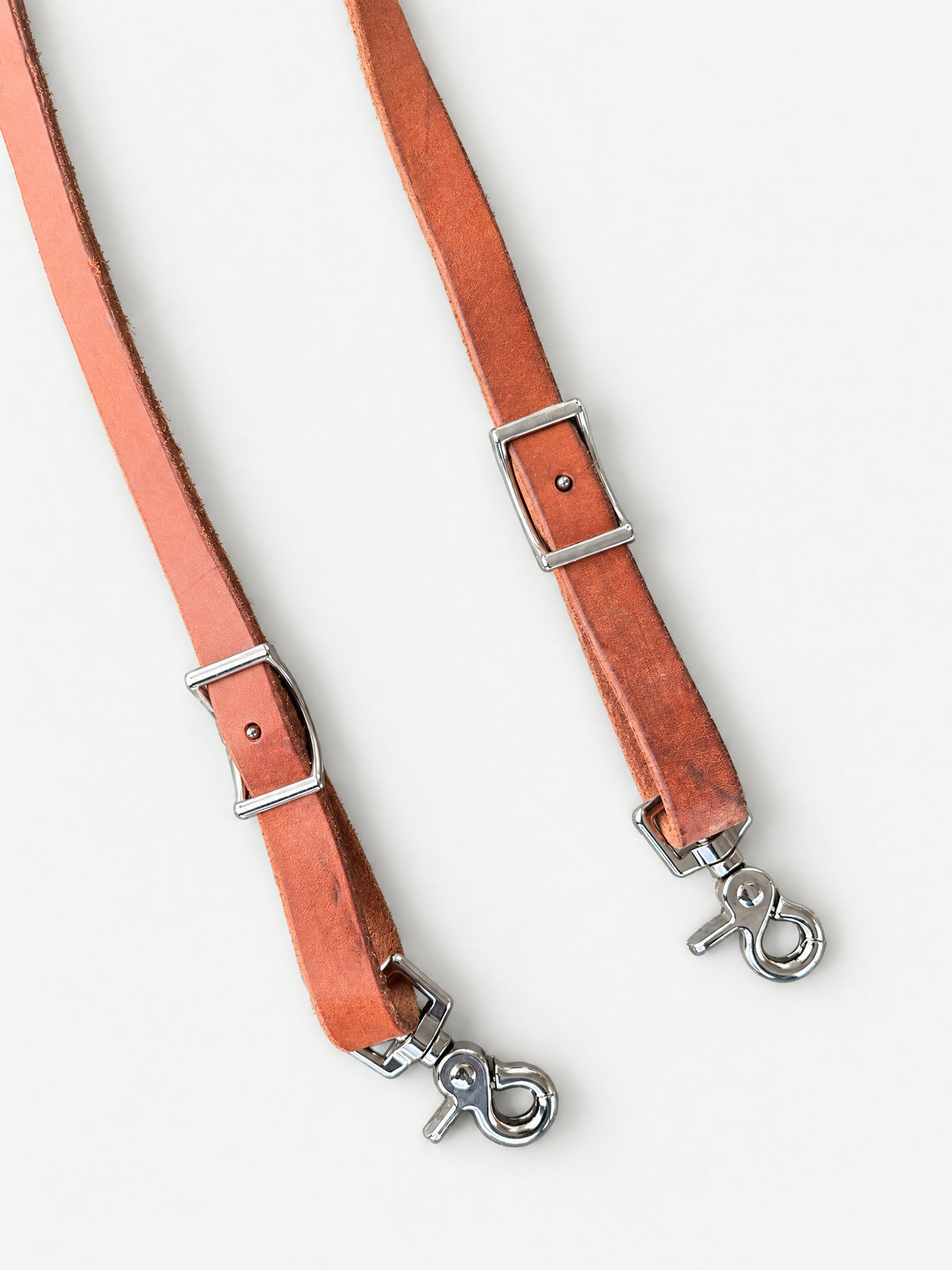 Natural Tan & Red laced leather barrel reins — attachment fittings