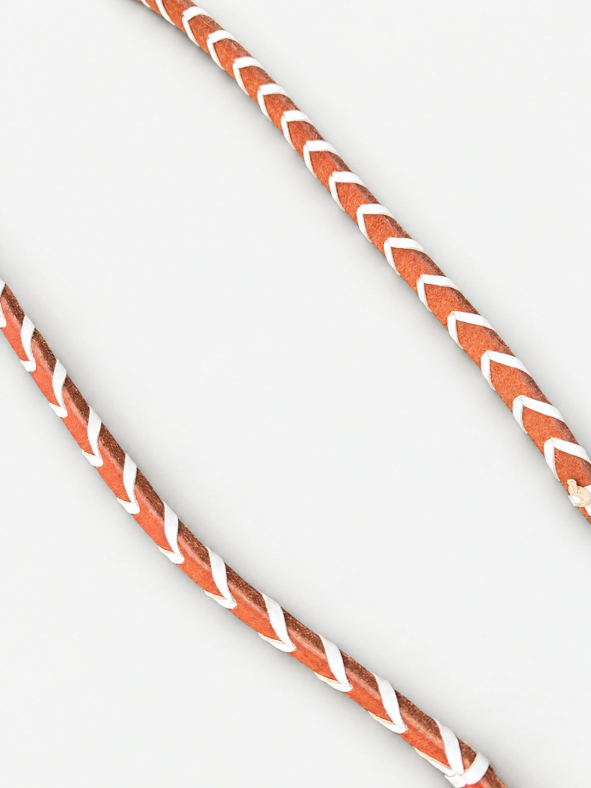 Tan & White laced leather barrel reins — lacing detail