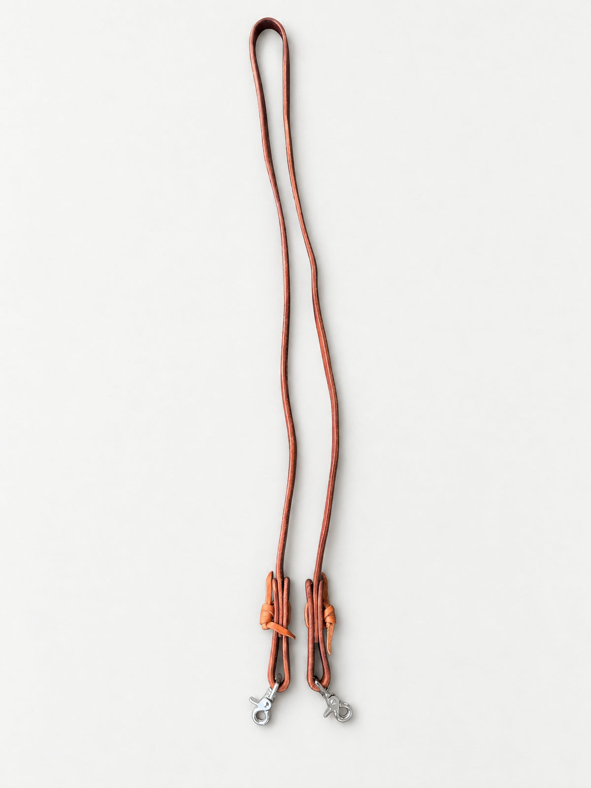 Plain brown leather barrel reins — full set